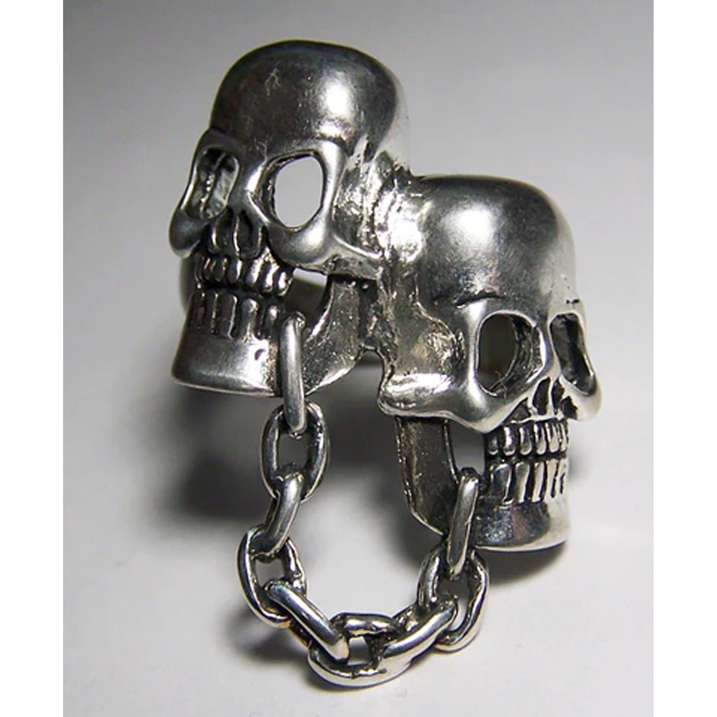 Chained Together Skull Heads Biker Ring - Wholesale